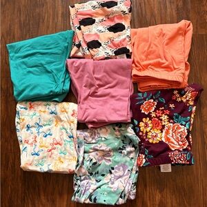 7 pairs of Dot Dot Smile Leggings Size 8/10